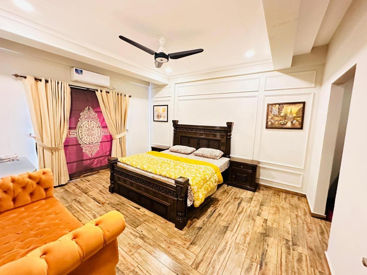 Holidazzle Serviced Apartments Bahria Town Ravalpindi Szoba fotó